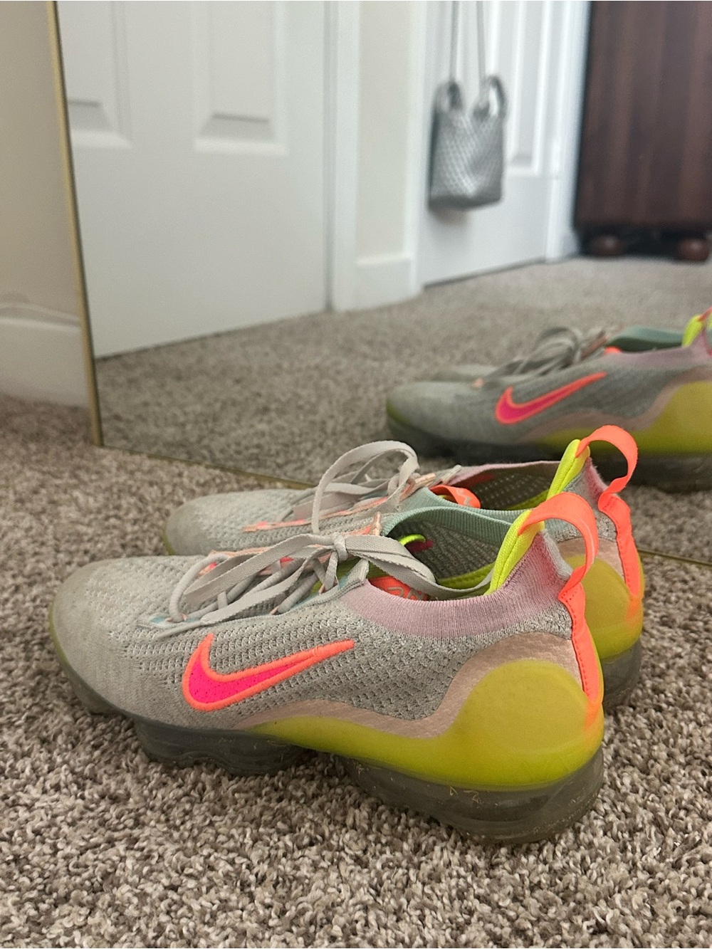 Nike Grey Sneakers with Neon Pink and Yellow Accents